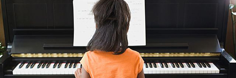 girl on piano