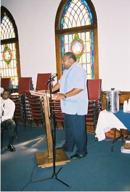 Rev. Charles W. Brooks address the ladies. 